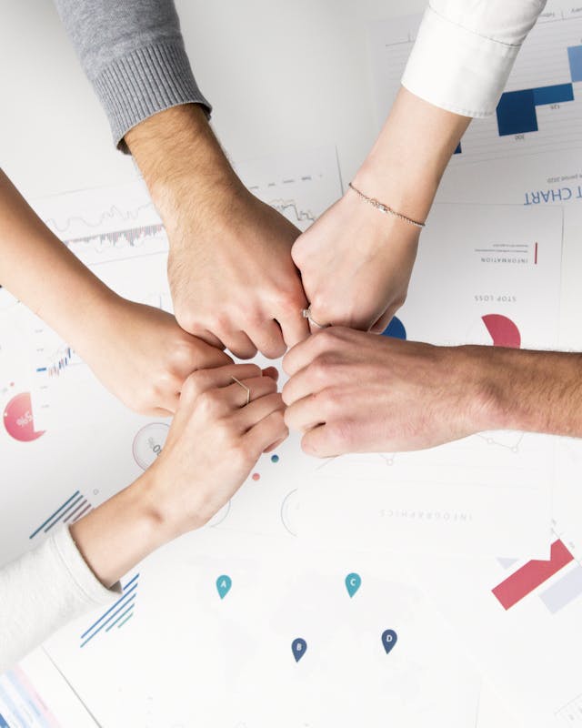 Hands meeting in the center